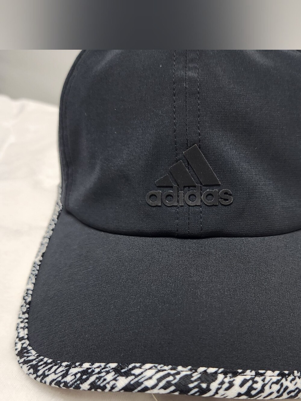 adidas Black Cap with Black-and-White Patterned Brim